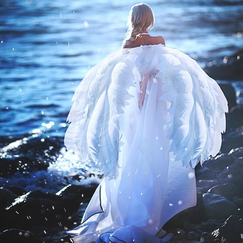 Person with Angel Wings — White, Serene, Afternoon, Photograph