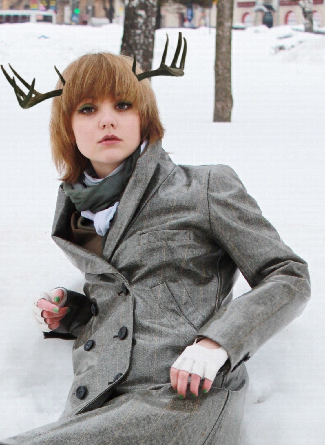 person with antlers in snow
