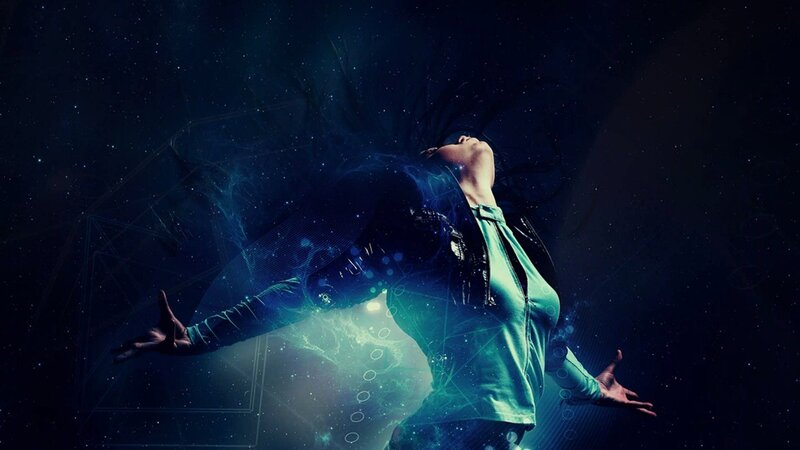 person with arms outstretched in space