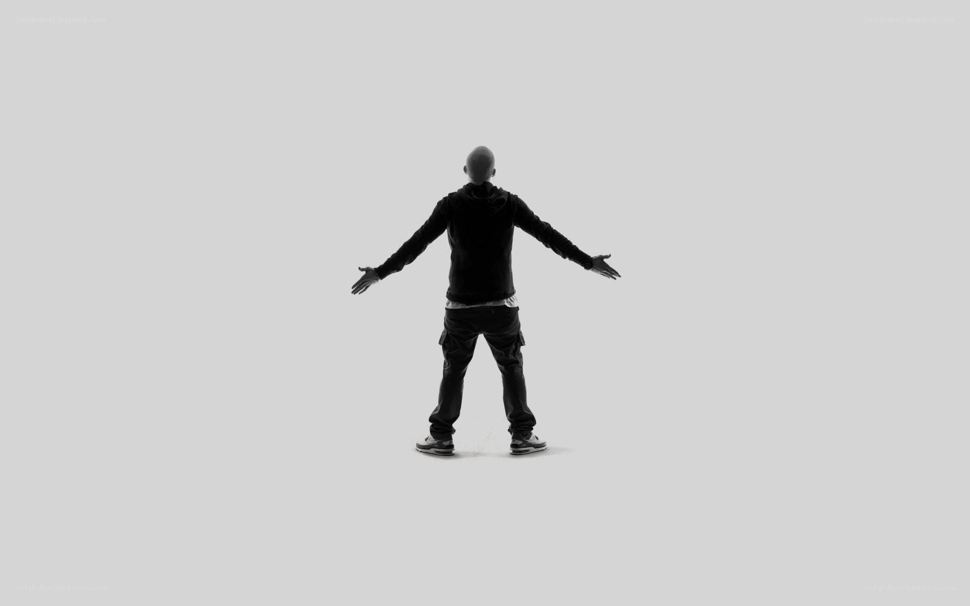 person with arms outstretched