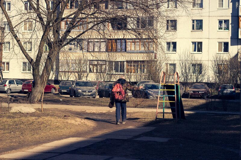 Person with Backpack — Brown