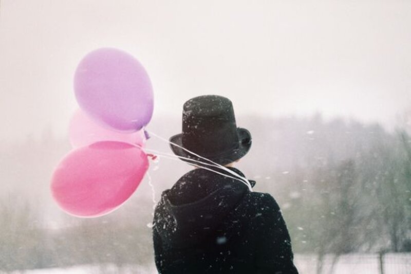 Person with Balloons