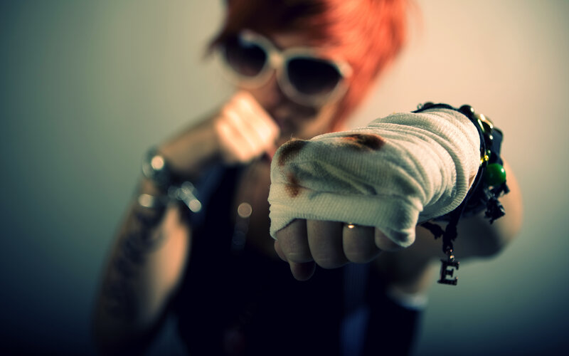 person with bandaged fist