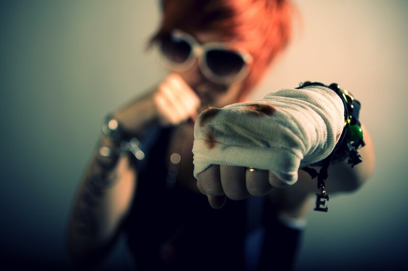 person with bandaged fist