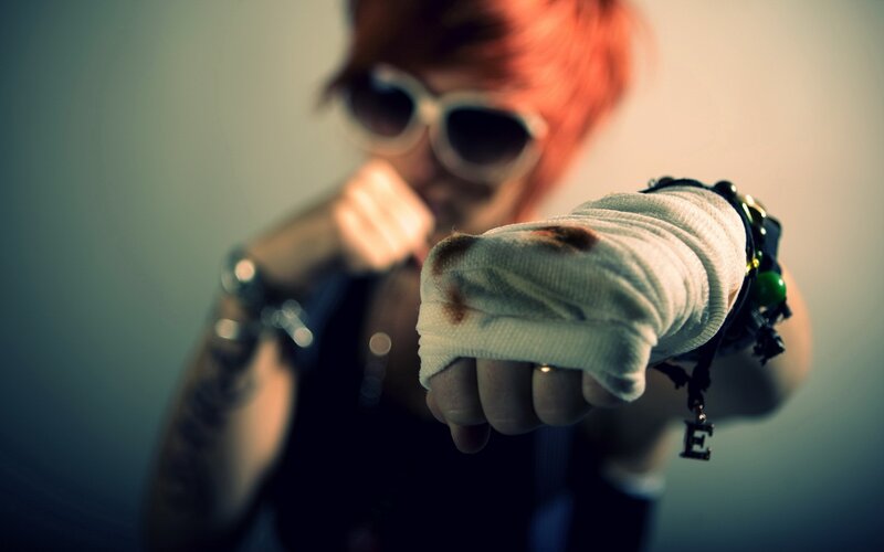 person with bandaged fist