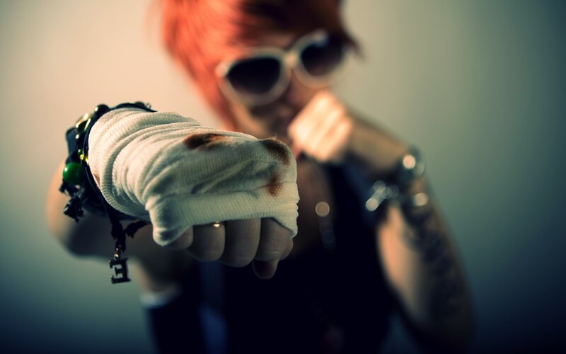 person with bandaged fist
