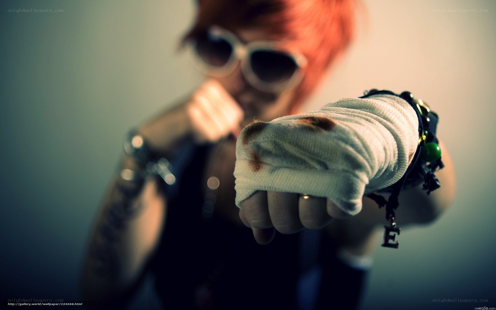 person with bandaged fist