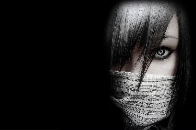person with bandana covering face