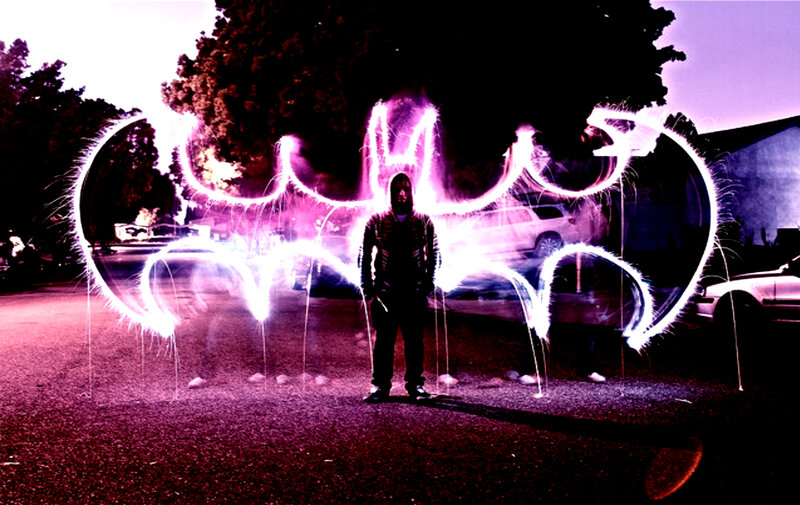 person with bat symbol light painting