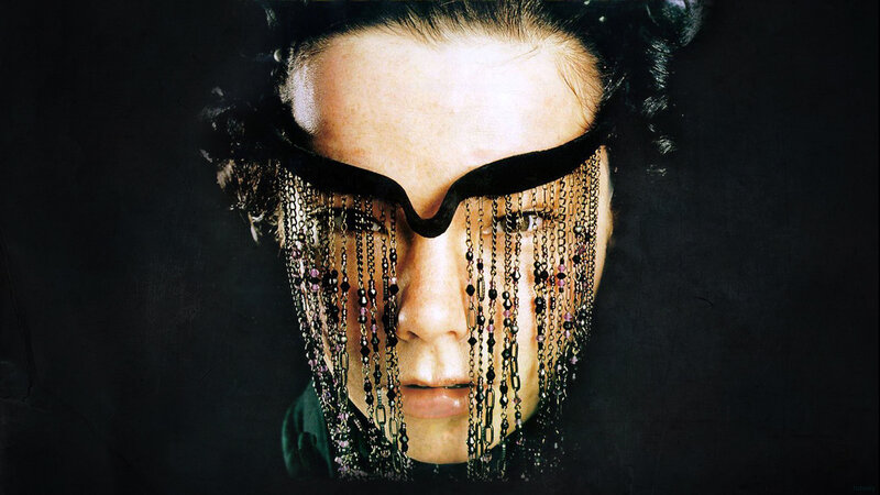 Person with Beaded Mask