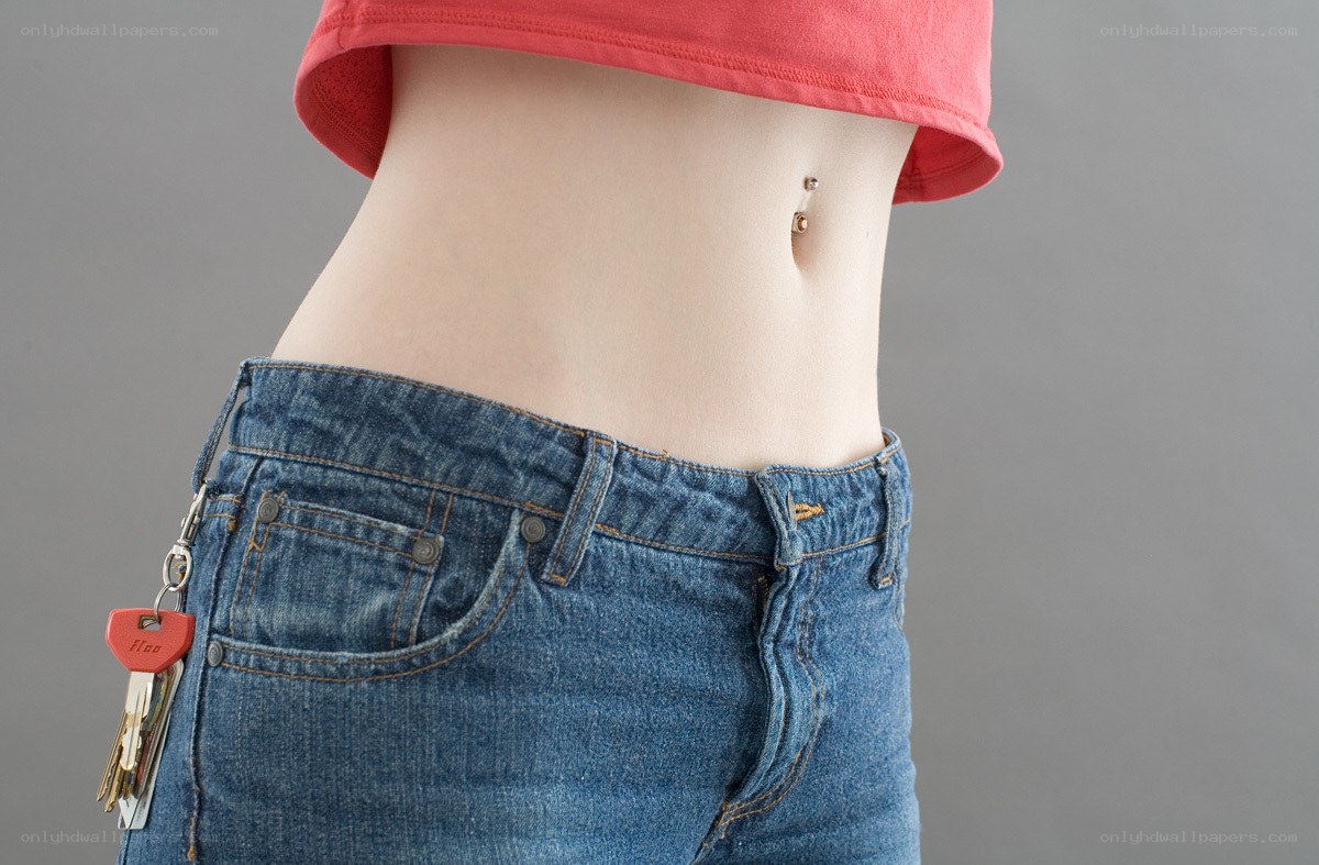 person with belly button piercing