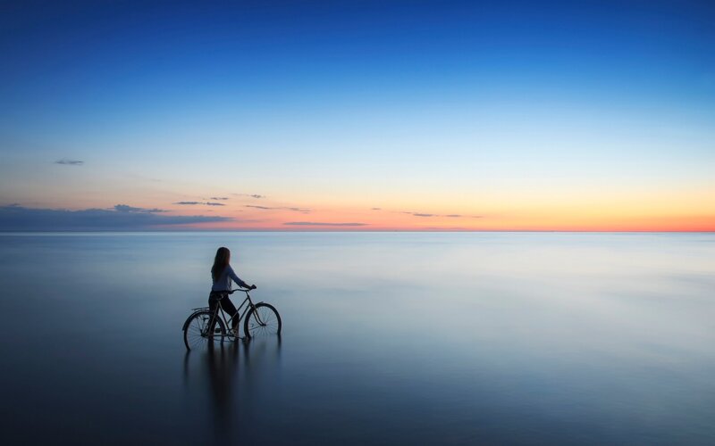 Person with Bicycle — Blue
