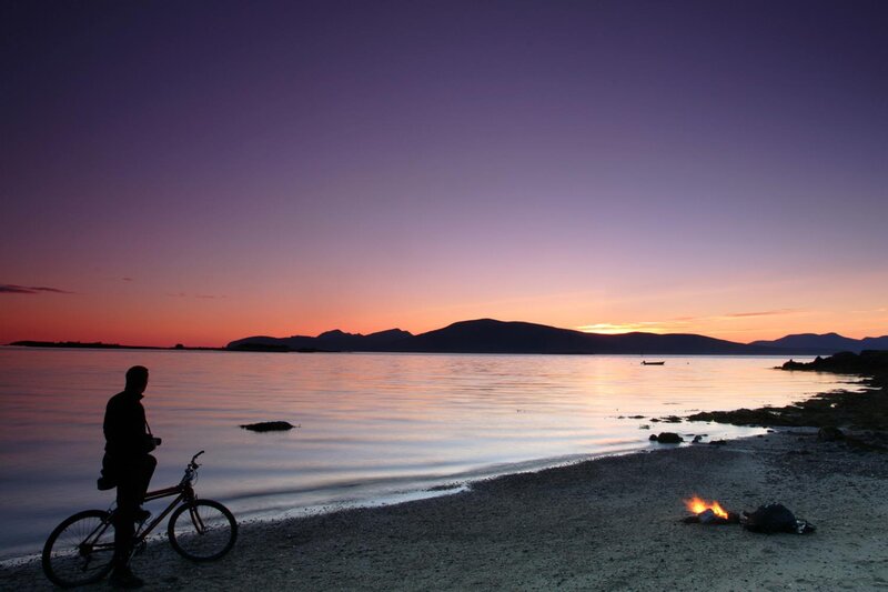 Person with Bicycle on Beach
