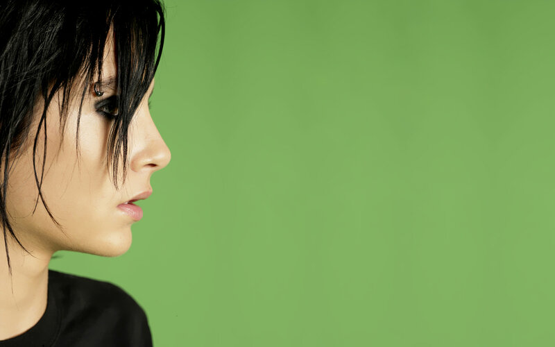 person with black hair in profile