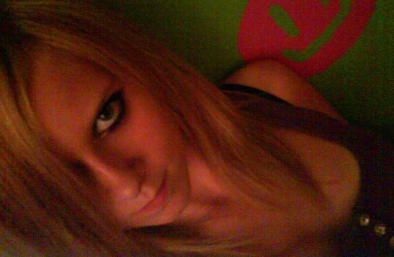 person with blonde hair lying down