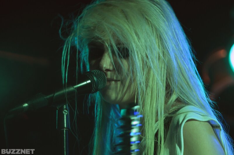 Person with Blonde Hair Singing — Blue, Dramatic