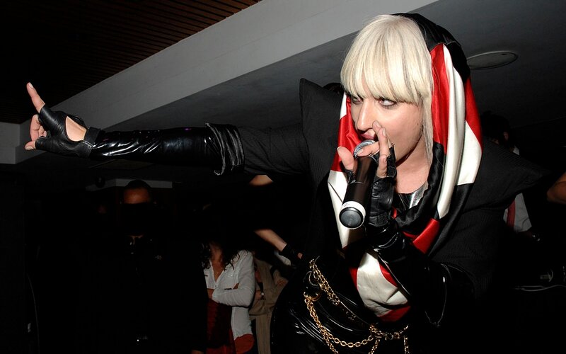 Person with Blonde Hair Singing