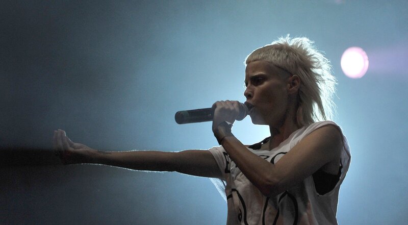 Person with Blonde Hair Singing — White