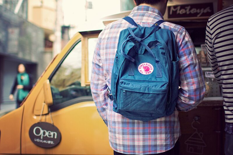 Person with Blue Backpack