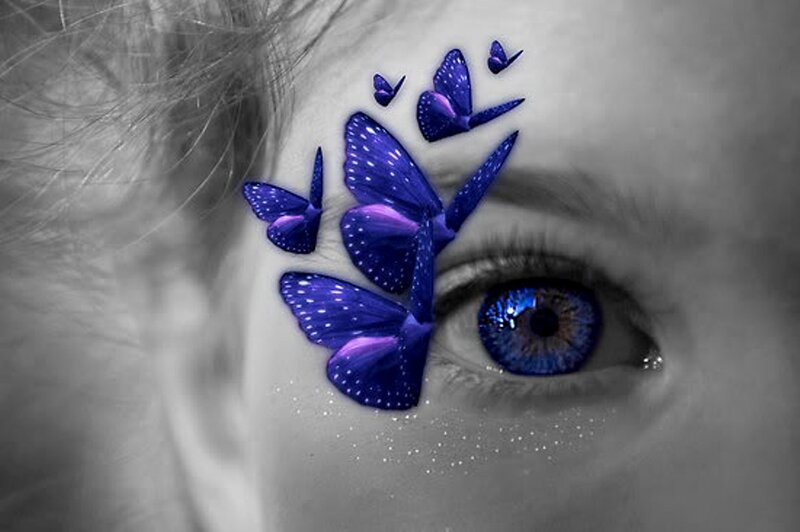 Person with Blue Butterflies