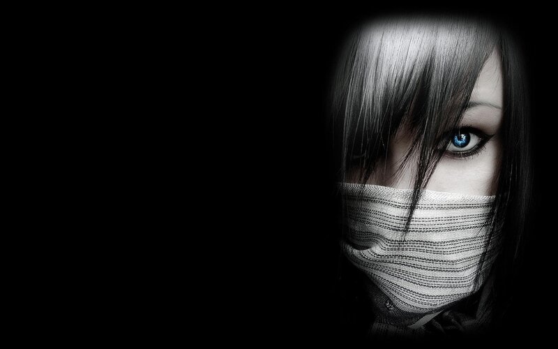 person with blue eyes and mask