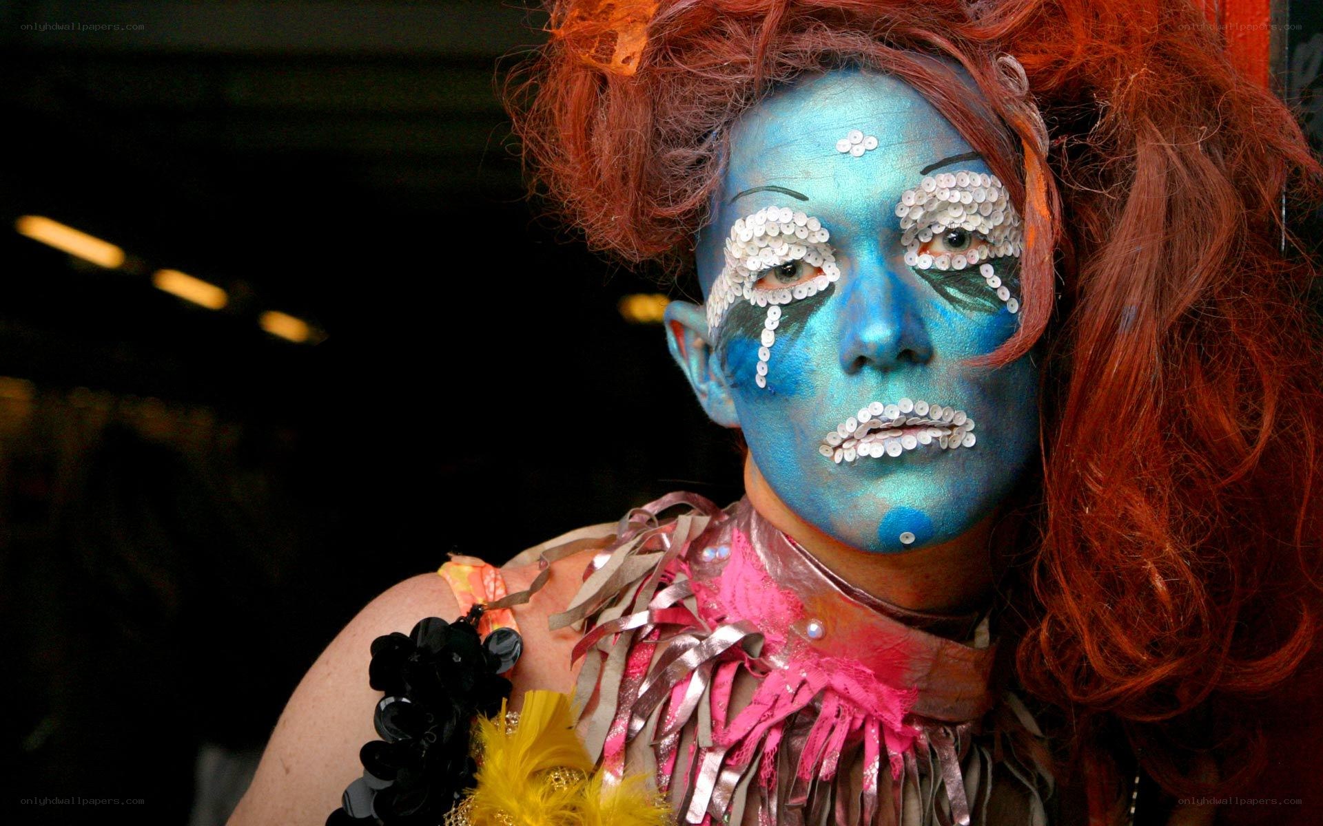 person with blue face paint