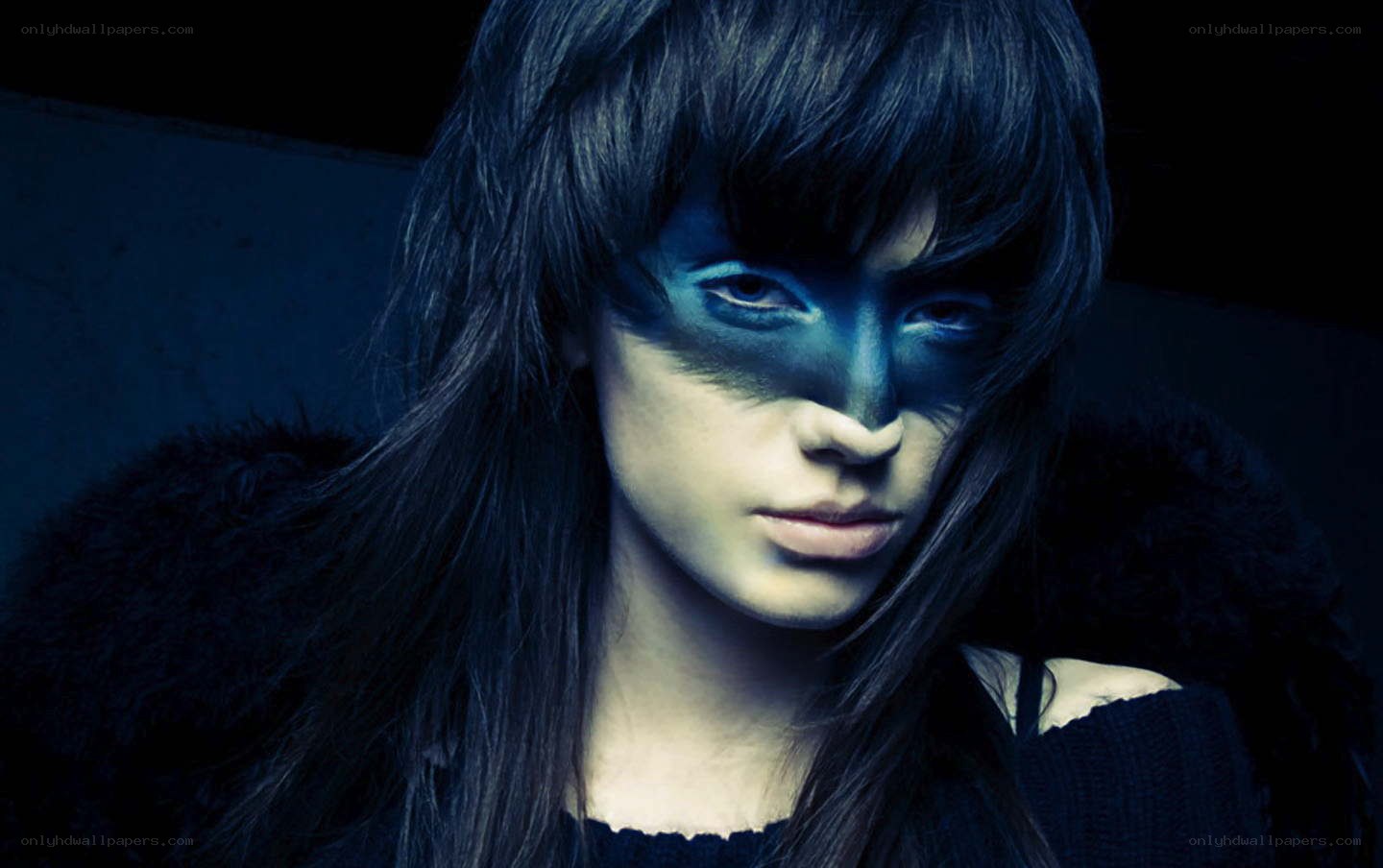 person with blue face paint