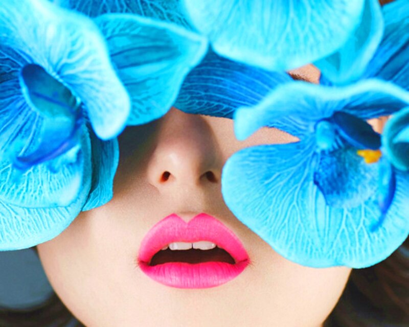 Person with Blue Flowers — Dramatic