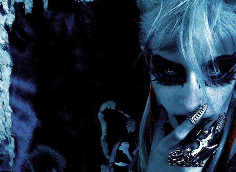 person with blue hair and makeup
