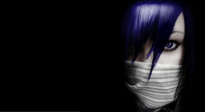 person with blue hair and mask