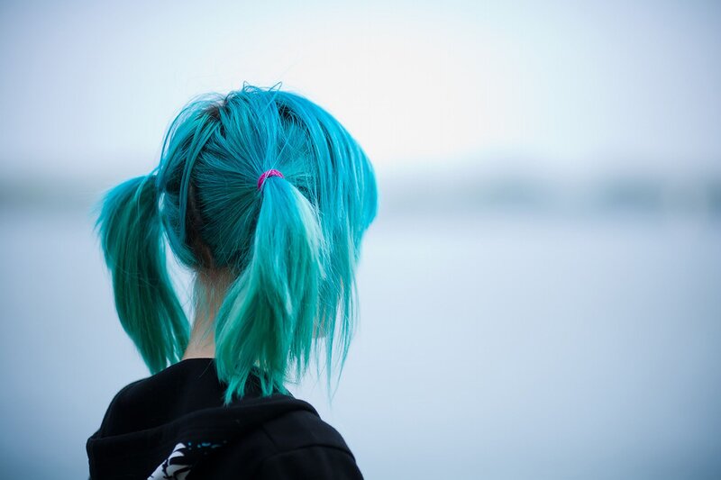 person with blue hair from behind