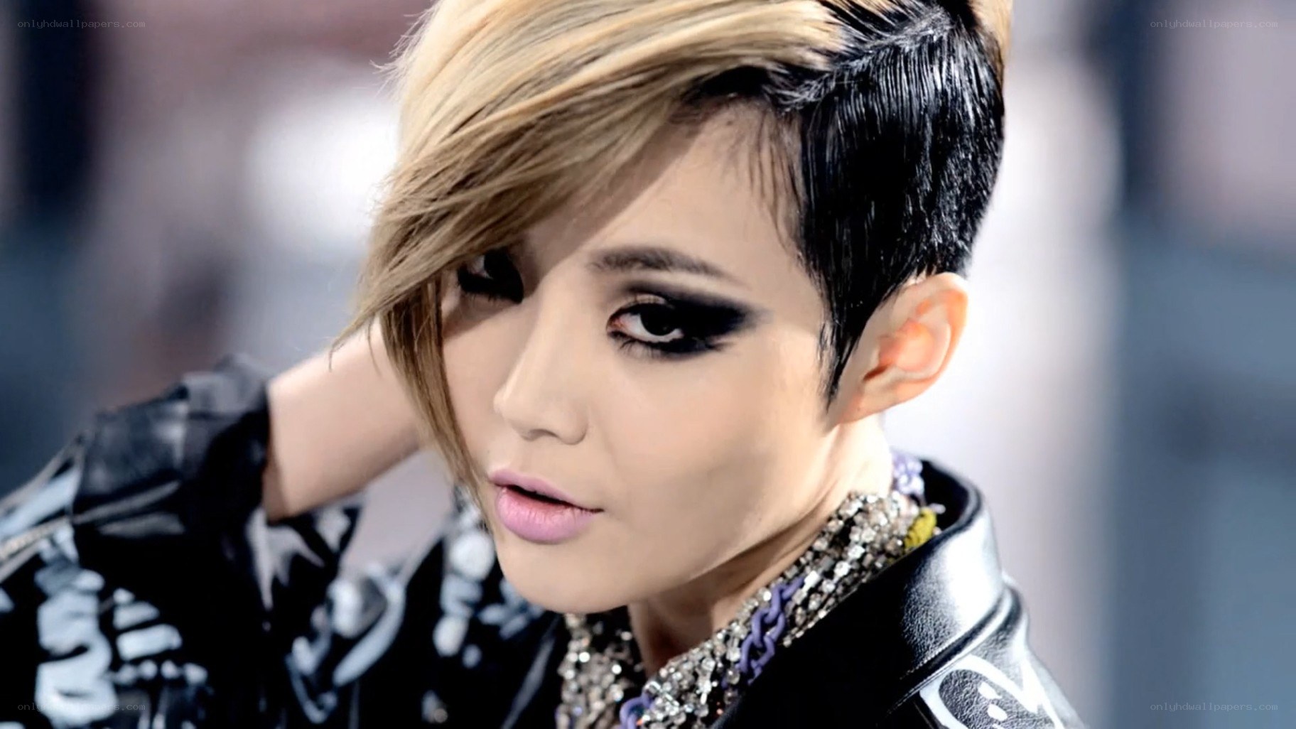 person with bold makeup and hairstyle