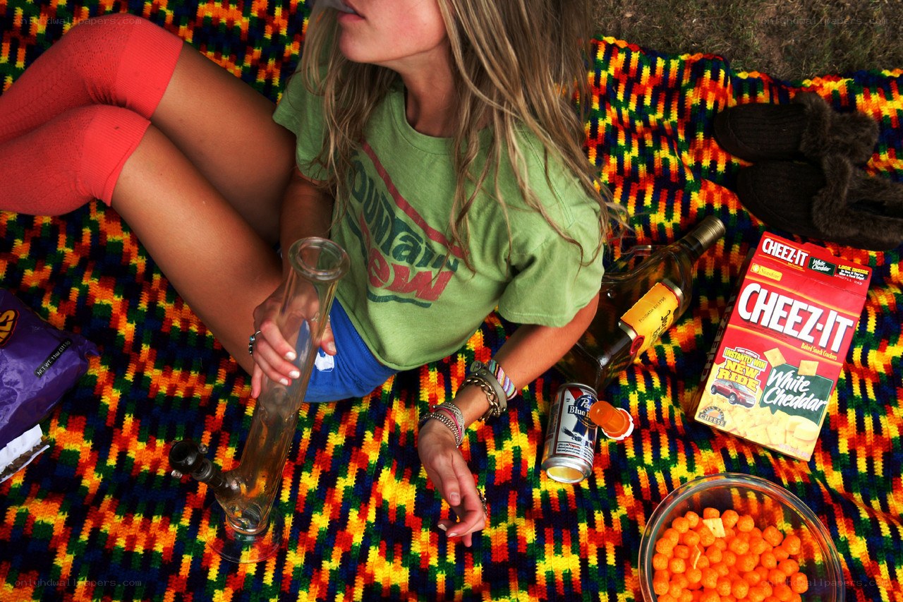 person with bong and snacks