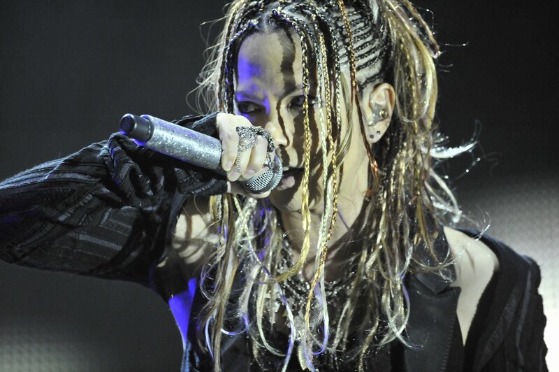 Person with Braided Hair Singing