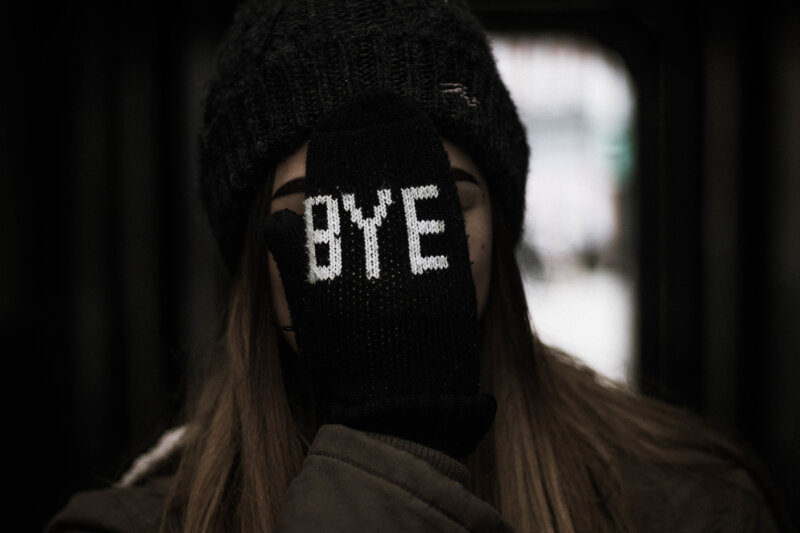 person with BYE glove