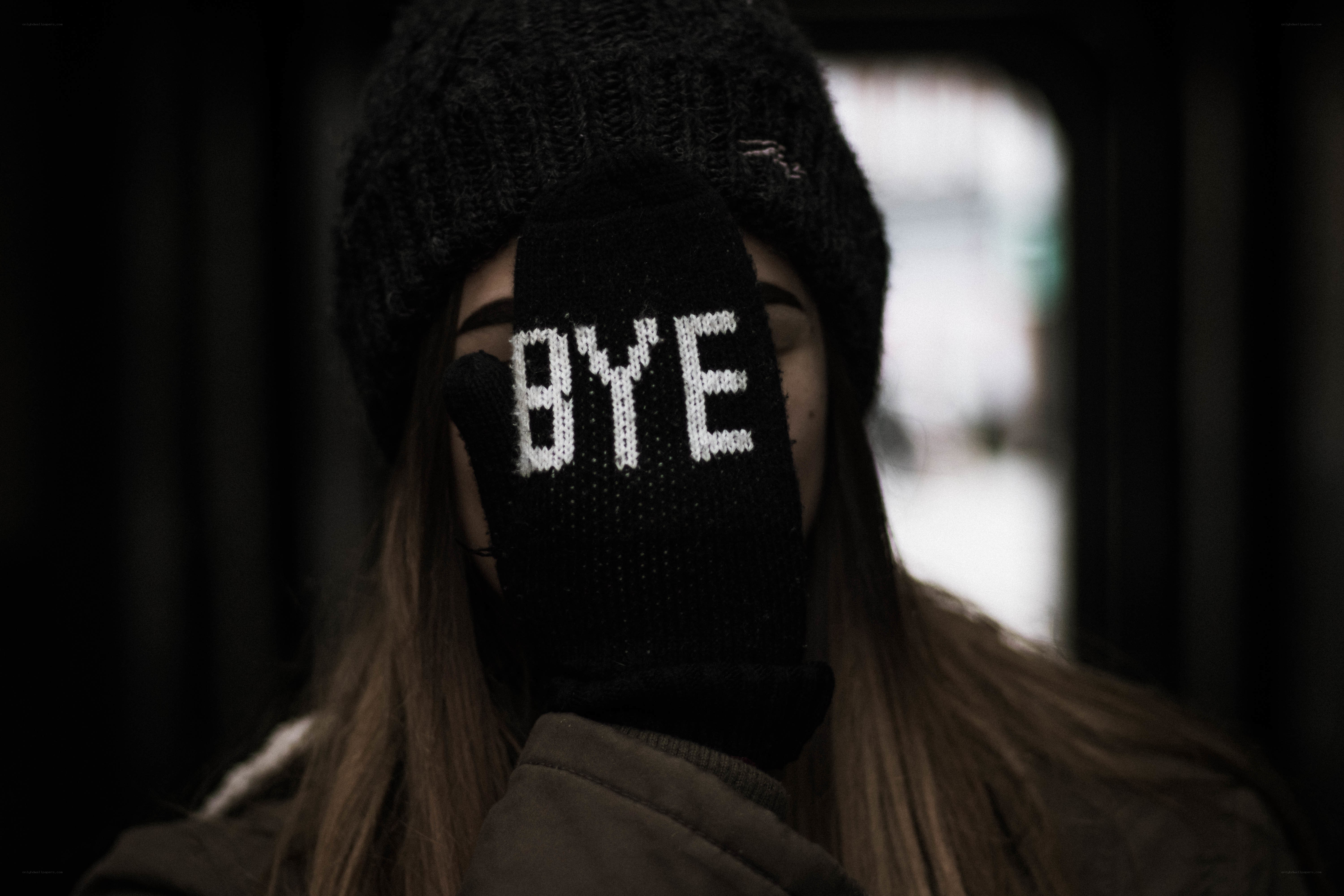 person with BYE glove
