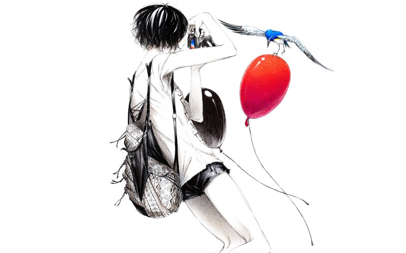 person with camera and balloon