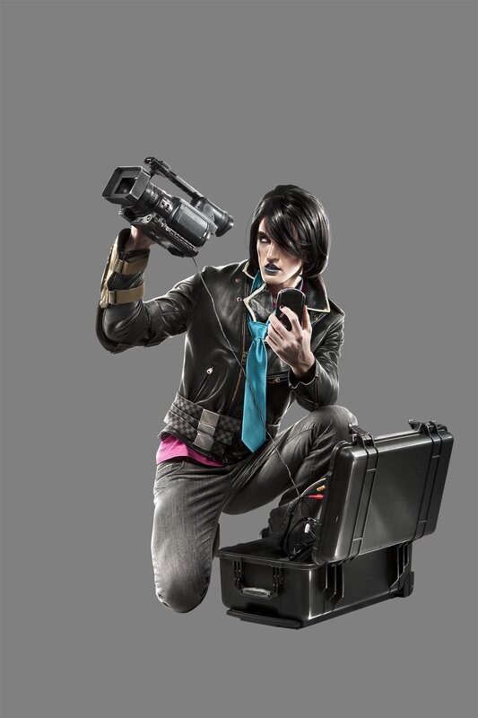 person with camera and phone