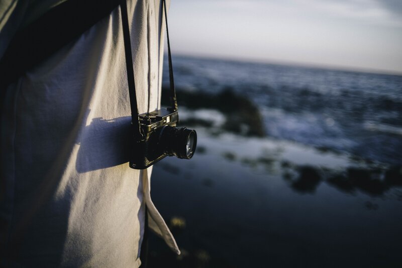 Person with Camera — White, Serene