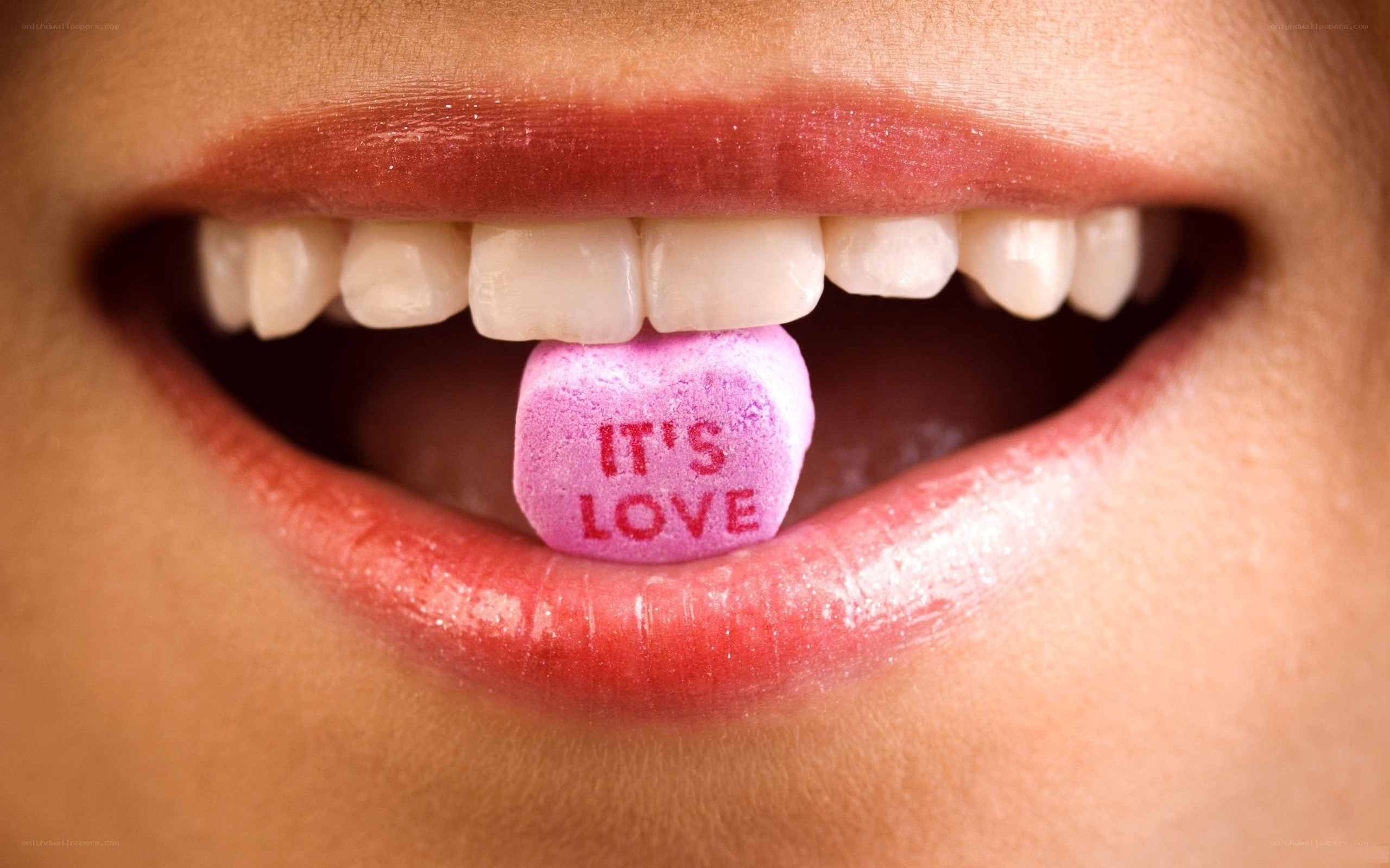person with candy in mouth