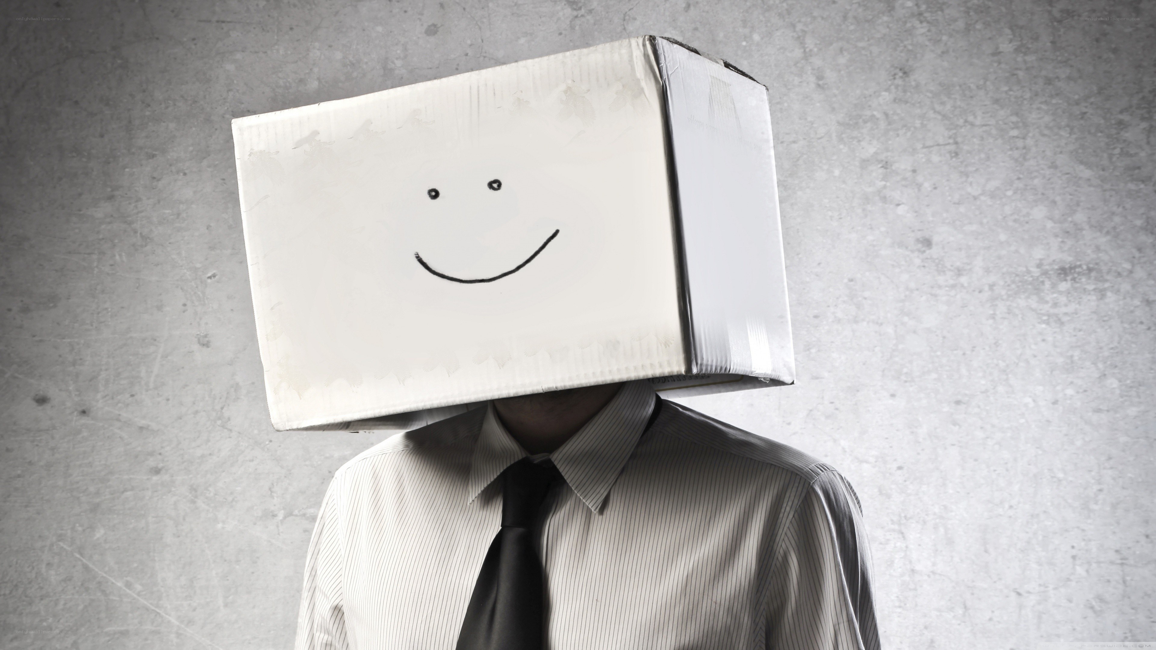 person with cardboard box head