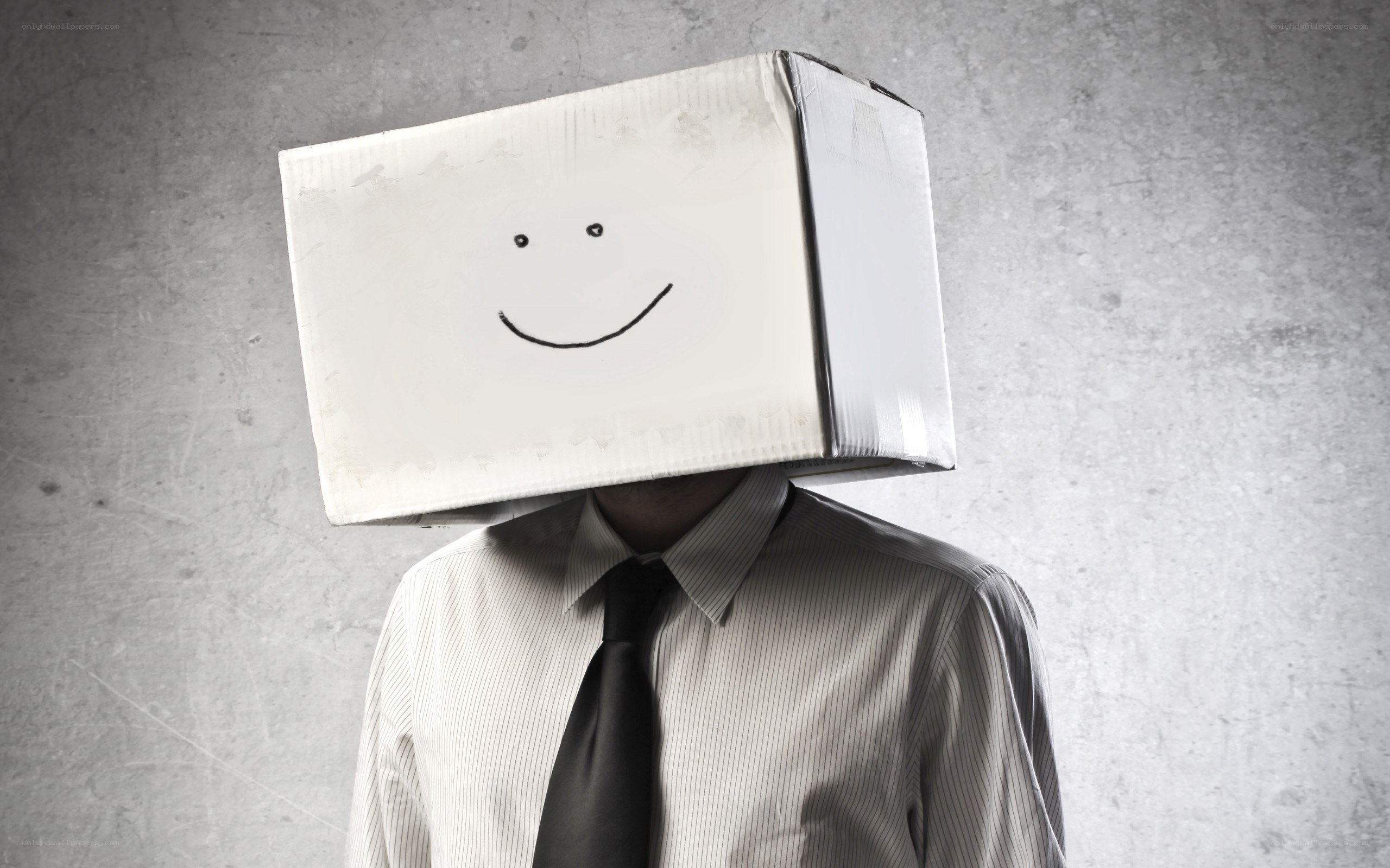 person with cardboard box on head