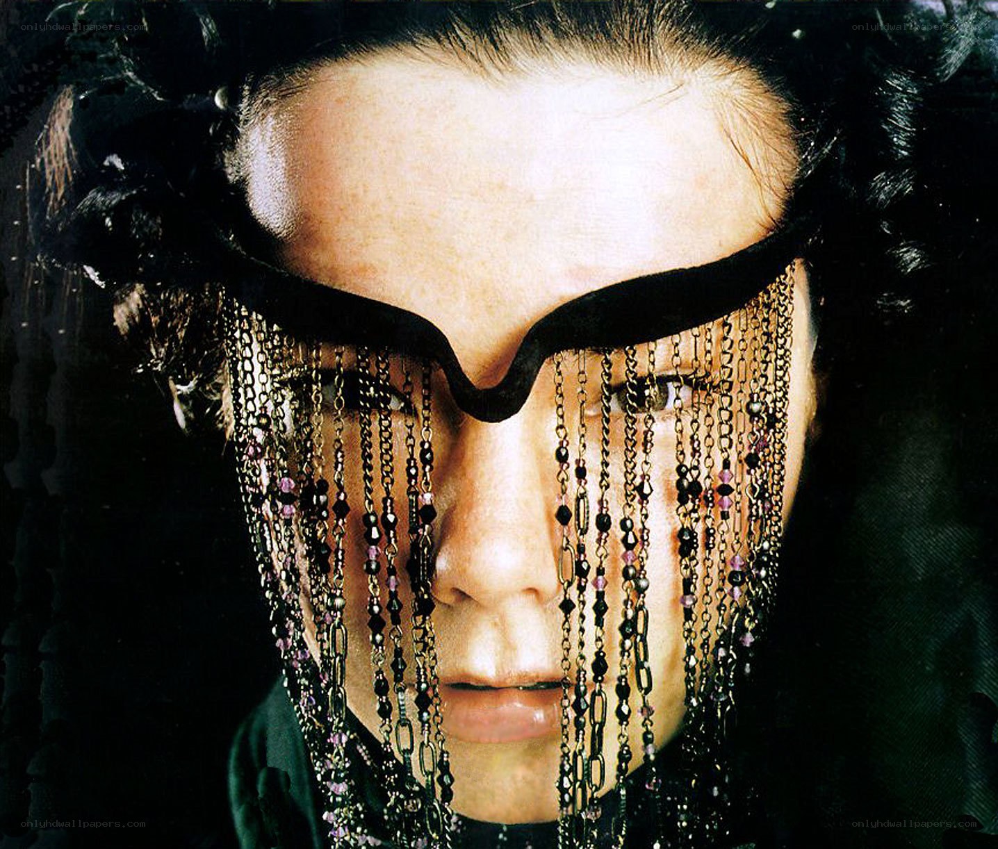 person with chain veil