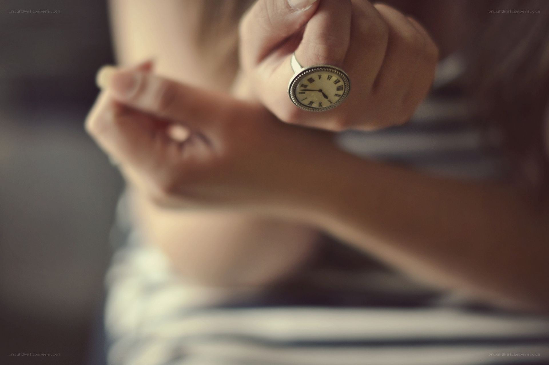 person with clock ring