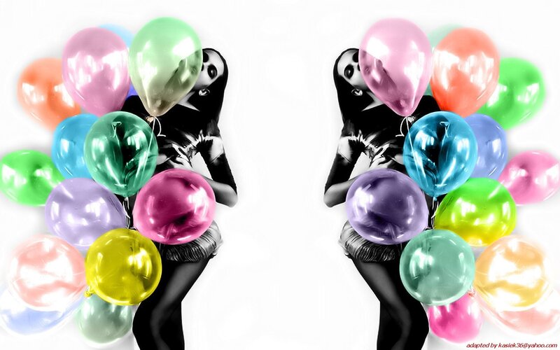 person with colorful balloons
