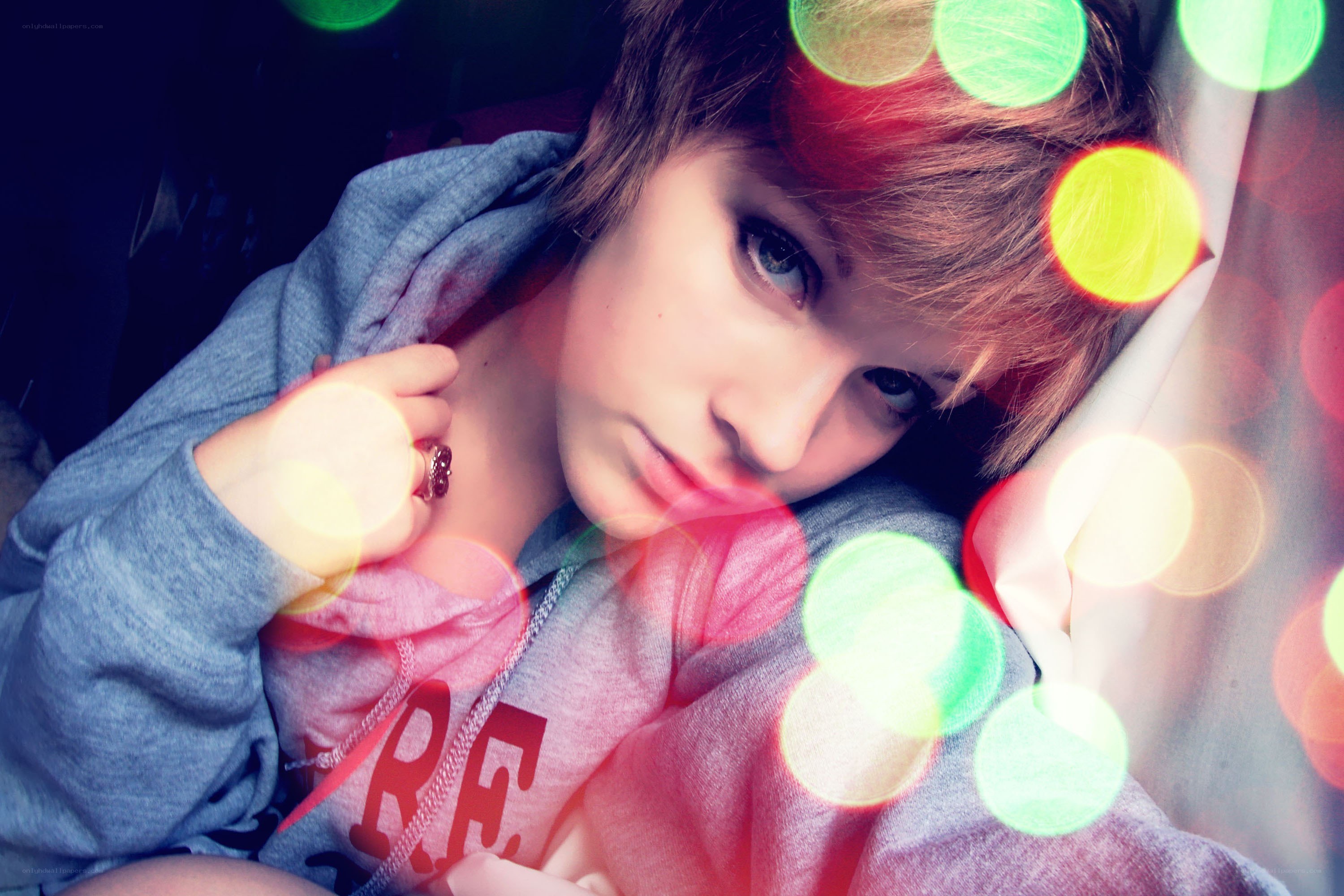 person with colorful lights