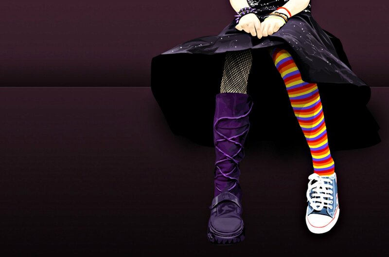 person with colorful socks and boots