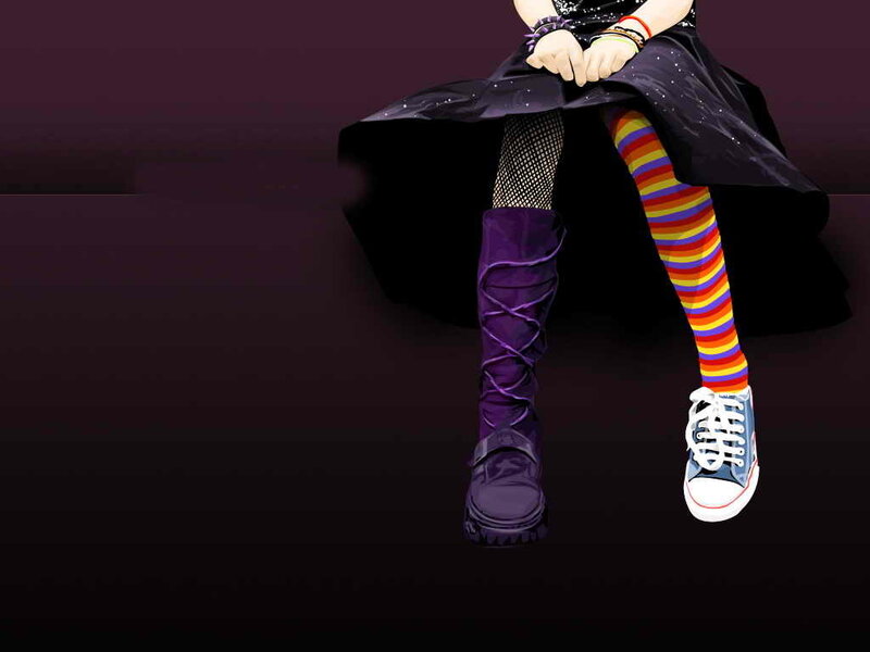 person with colorful socks and boots