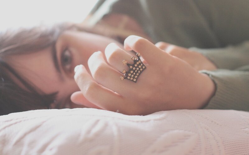 person with crown ring
