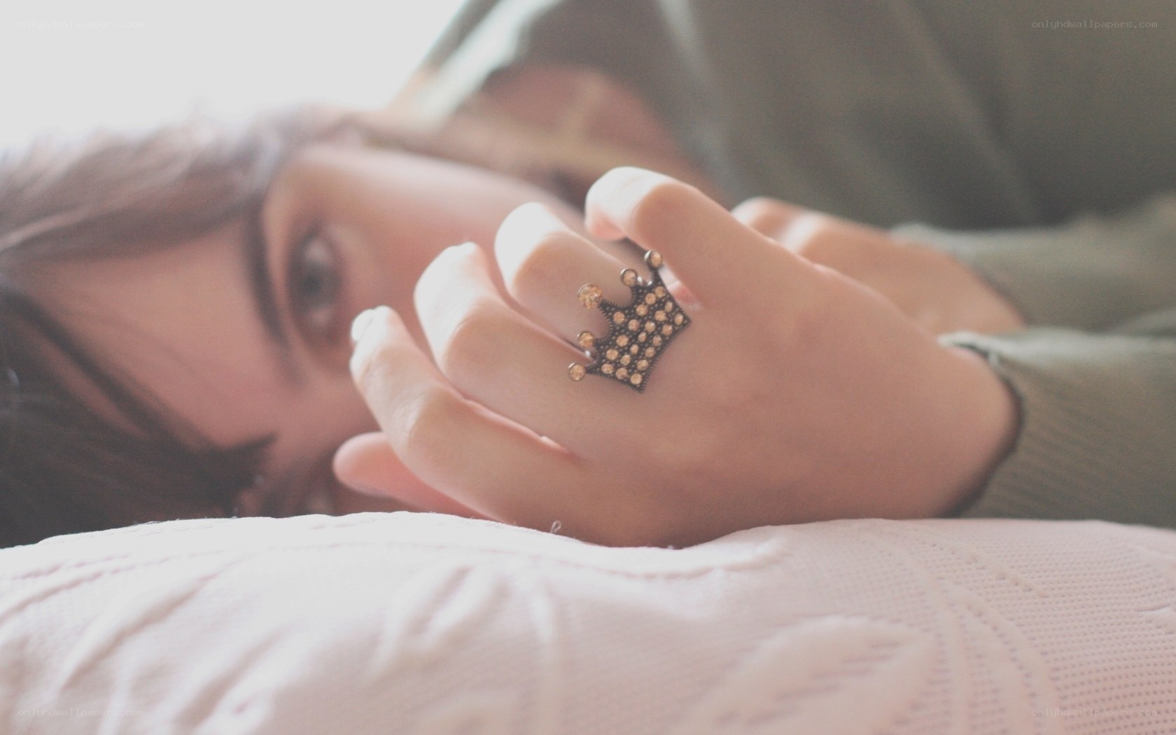 person with crown ring